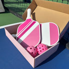 two pickleball paddle set with pink balls